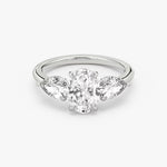 Load image into Gallery viewer, Oval Cut - Plain Band - Three Stone Ring- 0.5 Ct Side Stone each - 18 K Gold