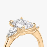 Load image into Gallery viewer, Emerald Cut - Plain Band - Three Stone Ring - 0.25 Ct Side Stone each - 18 K Gold
