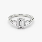 Emerald Cut - Plain Band - Three Stone Ring - 0.25 Ct Side Stone each - 18 K Gold