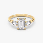 Emerald Cut - Plain Band - Three Stone Ring - 0.25 Ct Side Stone each - 18 K Gold