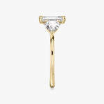 Load image into Gallery viewer, Emerald Cut - Plain Band - Three Stone Ring- 0.5 Ct Side Stone each - 18 K Gold
