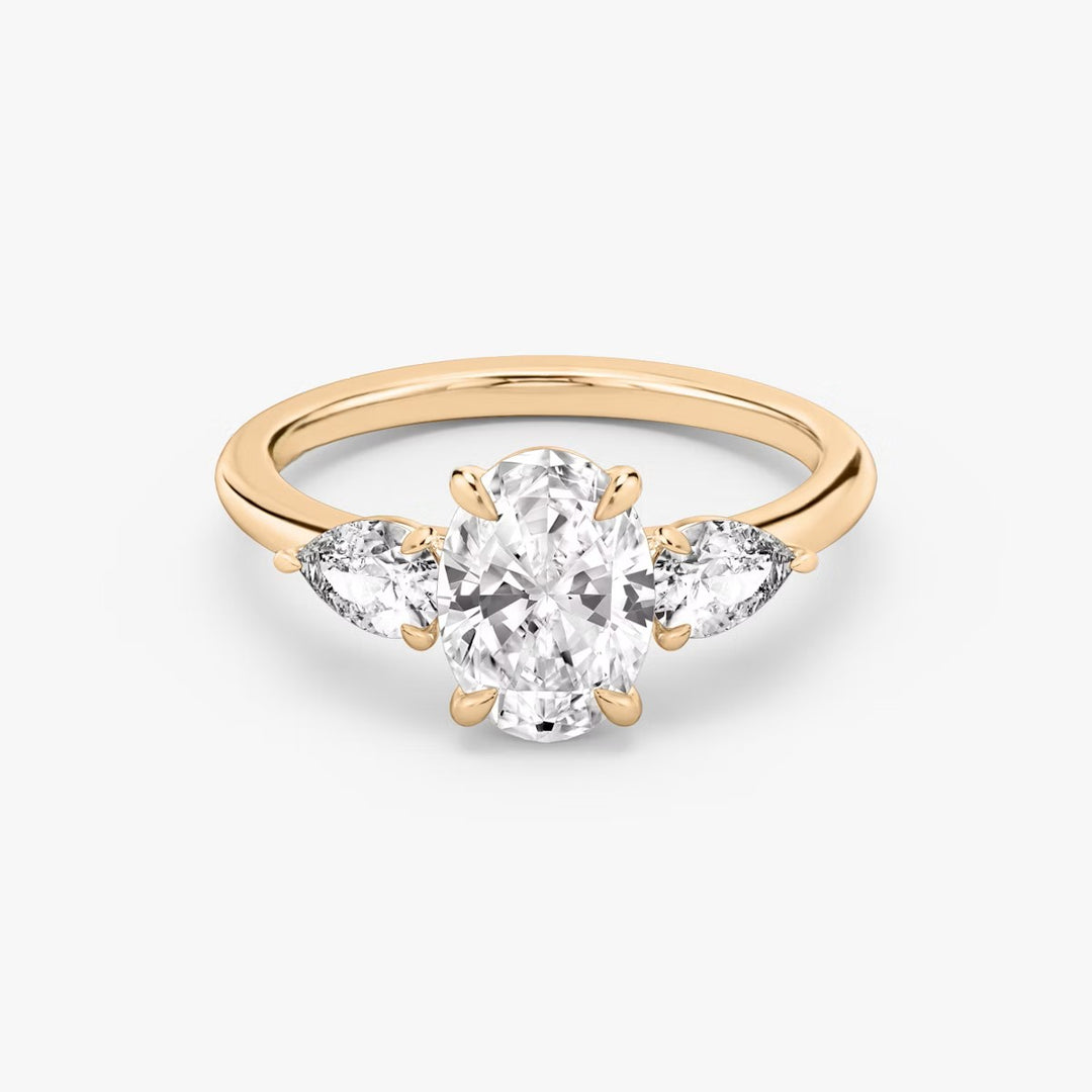 Oval Cut - Plain Band - Three Stone Ring - 0.25 Ct Side Stone each - 14 K Gold