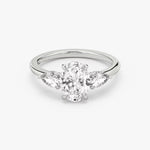Load image into Gallery viewer, Oval Cut - Plain Band - Three Stone Ring - 0.25 Ct Side Stone each - 18 K Gold
