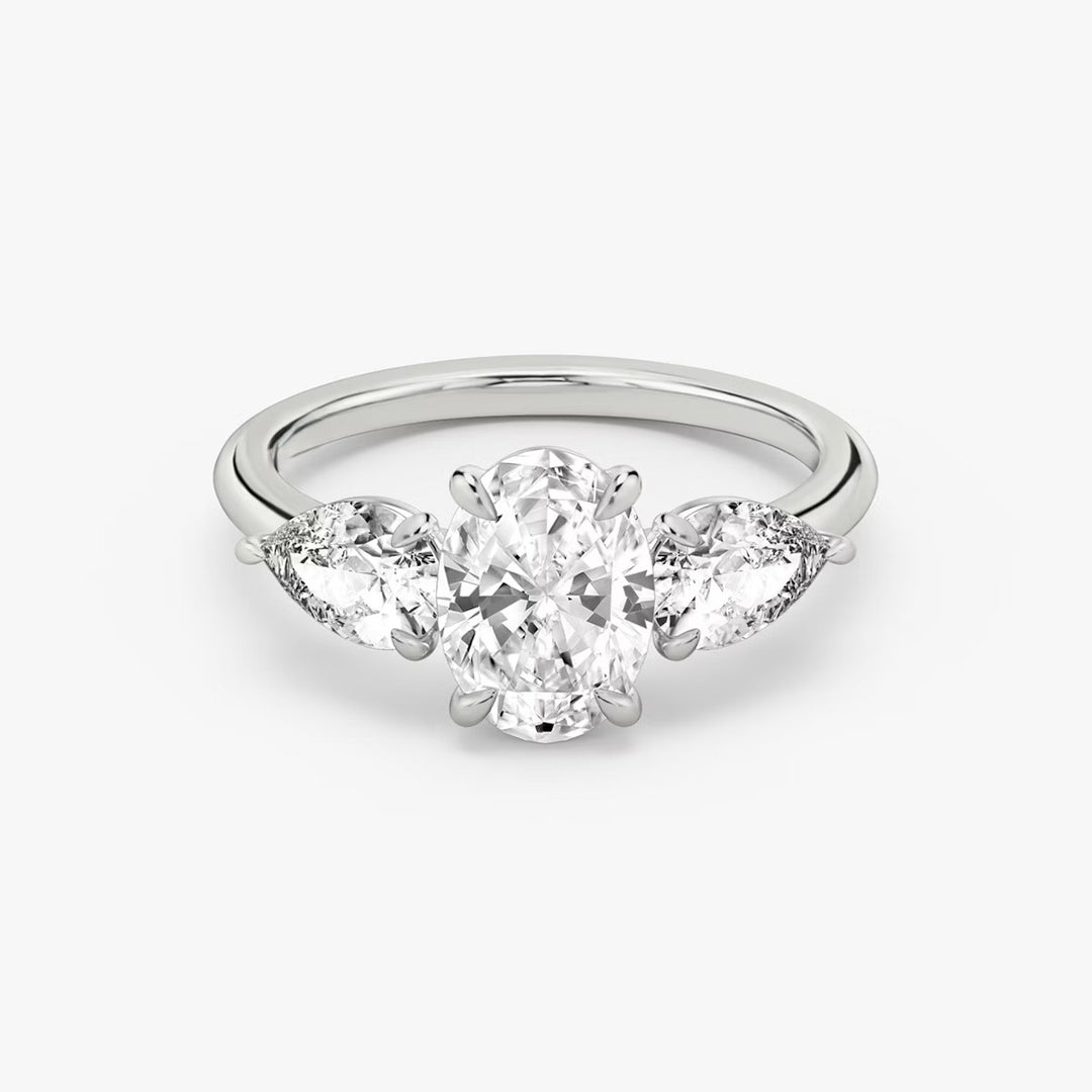 Oval Cut - Plain Band - Three Stone Ring- 0.5 Ct Side Stone each - 18 K Gold