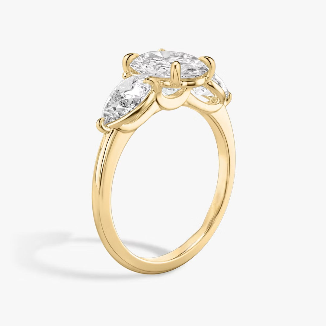 Oval Cut - Plain Band - Three Stone Ring- 0.5 Ct Side Stone each - 18 K Gold