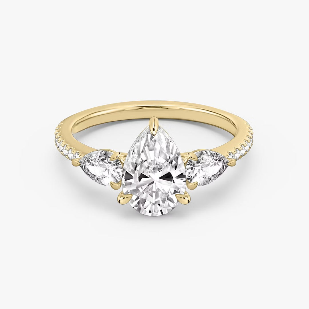Pear Cut - Pave Band - Three Stone Ring - 0.25 Ct Side Stone each - 18 K Gold