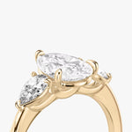 Load image into Gallery viewer, Pear Cut - Plain Band - Three Stone Ring - 0.25 Ct Side Stone each - 14 K Gold
