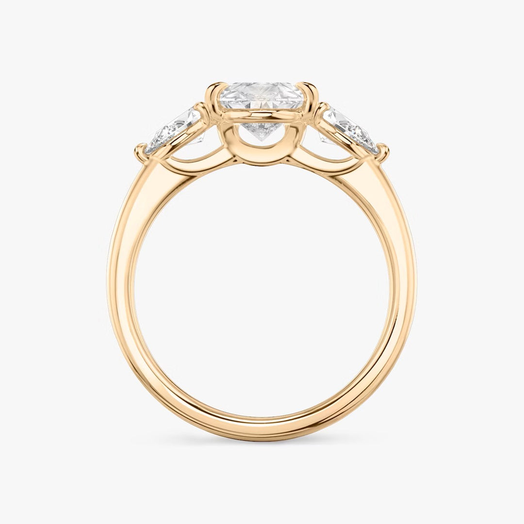 Pear Cut - Plain Band - Three Stone Ring - 0.25 Ct Side Stone each - 18 K Gold