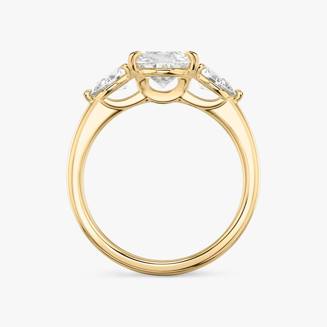 Pear Cut - Plain Band - Three Stone Ring - 0.25 Ct Side Stone each - 14 K Gold
