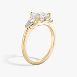 Load image into Gallery viewer, Pear Cut - Plain Band - Three Stone Ring - 0.25 Ct Side Stone each - 14 K Gold
