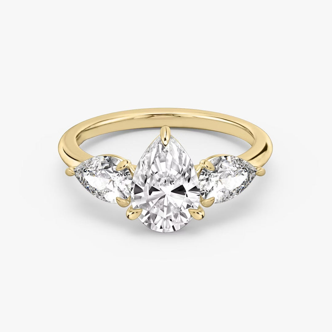 Pear Cut - Plain Band - Three Stone Ring- 0.5 Ct Side Stone each - 18 K Gold