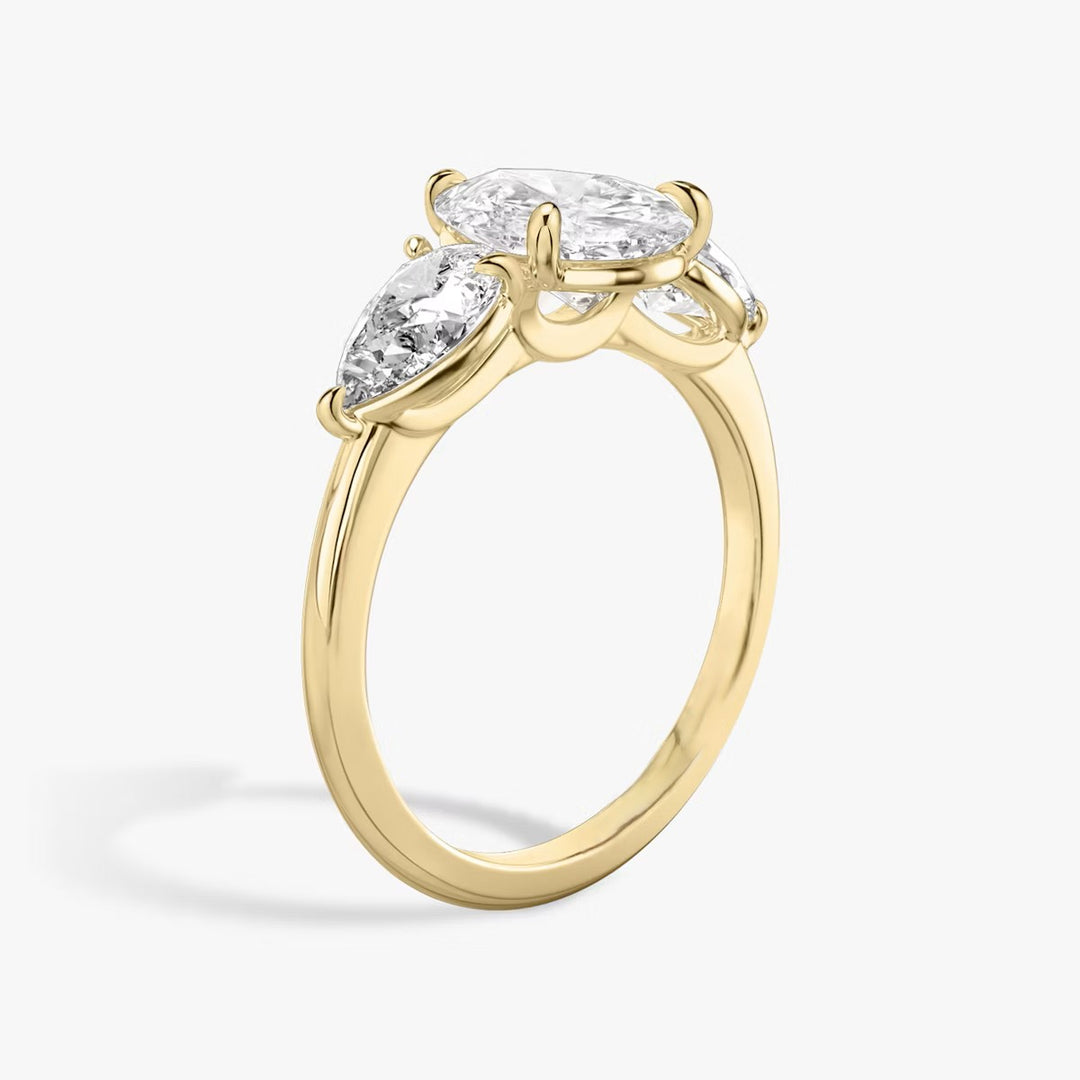 Pear Cut - Plain Band - Three Stone Ring- 0.5 Ct Side Stone each - 18 K Gold
