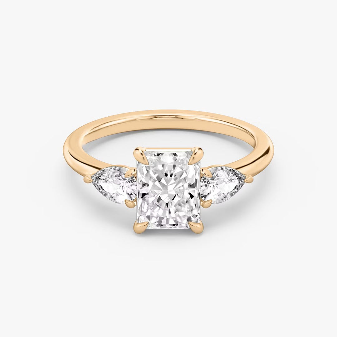 Radiant Cut - Plain Band - Three Stone Ring - 0.25 Ct Side Stone each - 18 K Gold