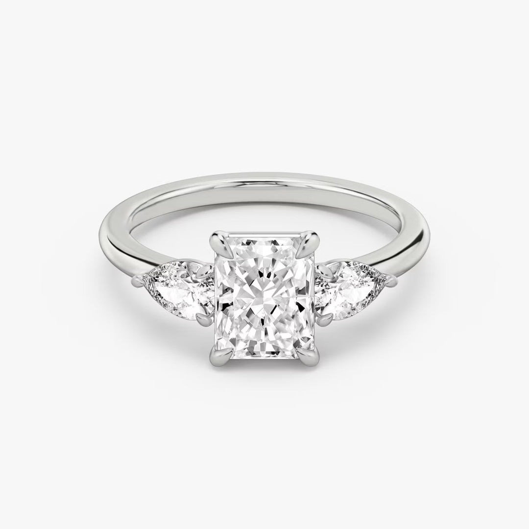 Radiant Cut - Plain Band - Three Stone Ring - 0.25 Ct Side Stone each - 18 K Gold
