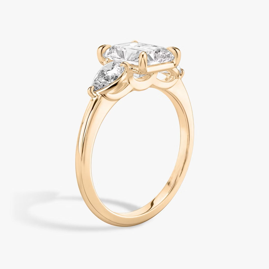 Radiant Cut - Plain Band - Three Stone Ring - 0.25 Ct Side Stone each - 18 K Gold