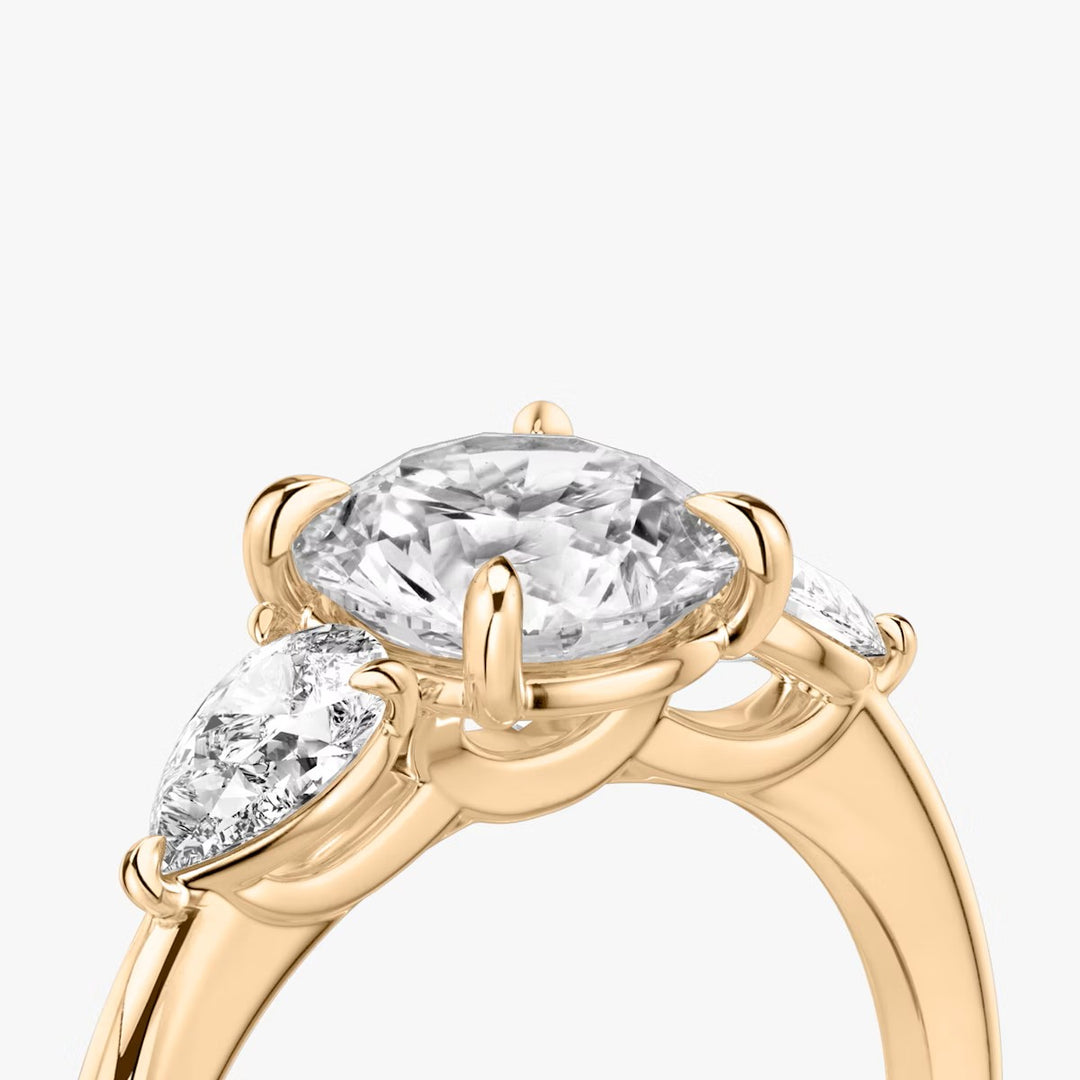 Round Cut - Plain Band - Three Stone Ring - 0.25 Ct Side Stone each - 18 K Gold