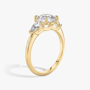 Round Cut - Plain Band - Three Stone Ring - 0.25 Ct Side Stone each - 18 K Gold