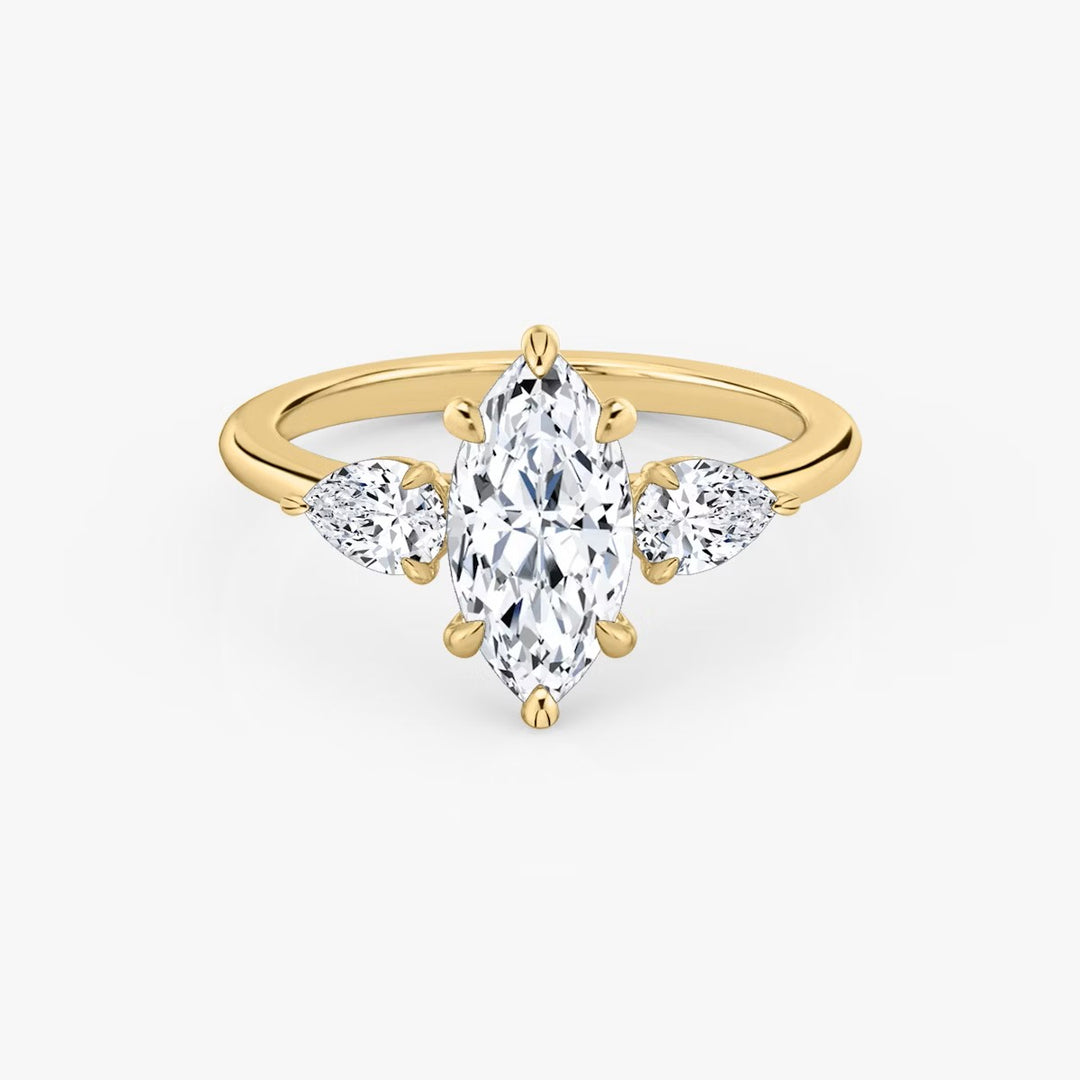 Marquise Cut - Plain Band - Three Stone Ring - 0.25 Ct Side Stone each - 18 K Gold