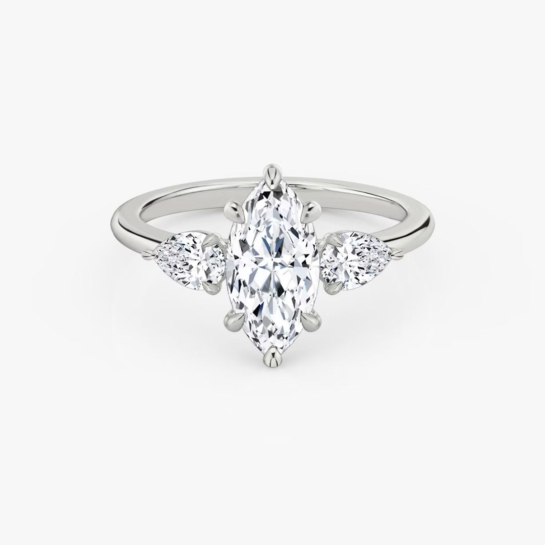 Marquise Cut - Plain Band - Three Stone Ring - 0.25 Ct Side Stone each - 18 K Gold
