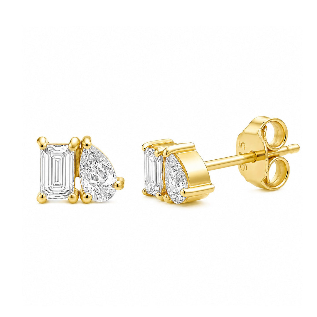 Toi et moi stud earrings with emerald cut and pear cut lab grown diamonds in gold vermeil